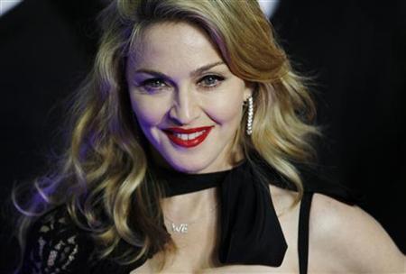 Director Madonna arrives for the premiere of her film W.E. in London January 11, 2012.