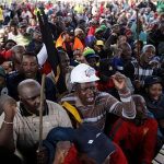 Striking workers take part in a march at Emalahleni, 100km (60 miles) east of Johannesburg
