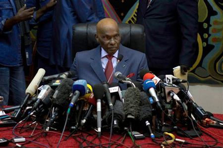 Senegal's President Abdoulaye Wade speaks to journalists at a news conference in Dakar