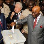 Senegal's President Abdoulaye Wade votes during Senegal's presidential election in the capital Dakar