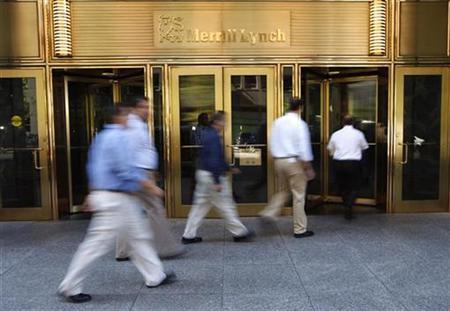 People walk by the Merrill Lynch building in New York