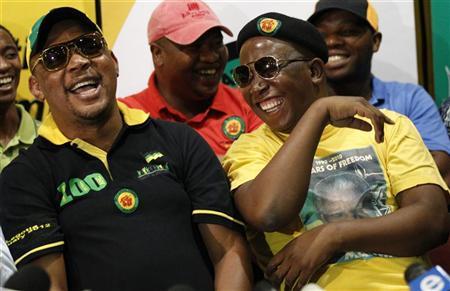 Expelled African National Congress Youth League (ANCYL) President Julius Malema (R) gestures with suspended ANCYL Treasurer-General Pule Mabe