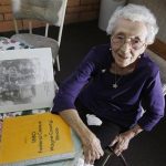 In this March 30, 2012, photo, Verla Morris, who will turn 100 later this year, poses for a photograph as she goes through some of her family census data from the 19th and 20th centuries at her local residential senior center in Chandler, Ariz. When the 1940 census records are released Monday, April 2, Morris will see her own name and details about her life in the records being released after 72 years of confidentiality expires, allowing her to find out more about her family tree. (AP Photo/Ross D. Franklin)
