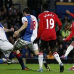Manchester United's Ashley Young (R) scores against Blackburn Rovers during their English Premier League match at Ewood Park, April 2, 2012. REUTERS/Darren Staples