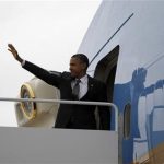 U.S. President Barack Obama waves as he steps aboard Air Force One at Andrews Air Force Base near Washington April 18, 2012. REUTERS/Jason Reed