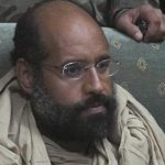 Saif al-Islam is seen after his capture, in the custody of revolutionary fighters in Obari, Libya November 19, 2011. REUTERS/Ammar El-Darwish