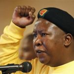 Suspended ANC Youth League President Julius Malema gestures as he sings during the league's three-day annual conference in Pretoria February 10, 2012. REUTERS/Siphiwe Sibeko