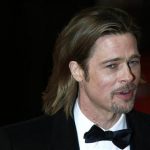 Actor Brad Pitt arrives for the British Academy of Film and Arts (BAFTA) awards ceremony at the Royal Opera House in London February 12, 2012. REUTERS/Luke MacGregor