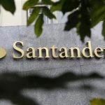 The logo of Spanish bank Santander is seen outside a building in Madrid October 27, 2011. REUTERS/Andrea Comas