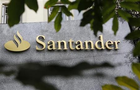 The logo of Spanish bank Santander is seen outside a building in Madrid October 27, 2011. REUTERS/Andrea Comas