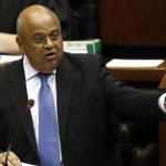 South Africa's Minister of Finance Pravin Gordhan delivers the 2010 budget speech at parliament in Cape Town, February 17, 2010. REUTERS/Nic Bothma/Pool