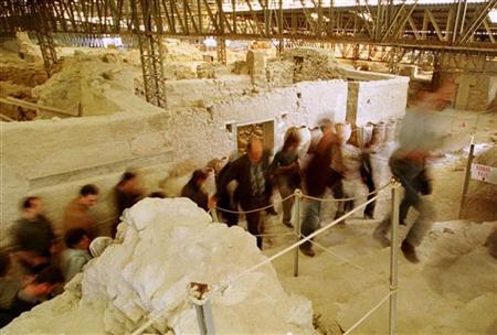VISITORS
LEAVE THE PREHISTORIC CITY OF AKROTIRI AT THE ISLAND OF SANTORINI. A group of journalists leave the archaeological site
of prehistoric city of Akrotiri at the volcanic cycladic island of Santorini March 27, 2000. YK