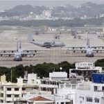 Hercules aircraft are parked on the tarmac at Marine Corps Air Station Futenma in Ginowan on Okinawa May 3, 2010. REUTERS/Issei Kato