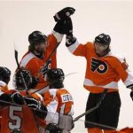 Philadelphia Flyers' Jakub Voracek (R) celebrates with teammates Scott Hartnell, top left, Wayne Simmonds (17) Braydon Coburn (5) and Sean Couturier after Simmonds scored on the Pittsburgh Penguins during the second period in Game 3 of their NHL Eastern Conference quarterfinal playoff hockey series in Philadelphia, April 15, 2012. REUTERS/Tim Shaffer