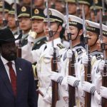 South Sudan's President Salva Kiir Mayardit (L) inspects an honour guard with his Chinese counterpart Hu Jintao (not pictured) during an official welcoming ceremony at the Great Hall of the People in Beijing April 24, 2012. REUTERS/Petar Kujundzic