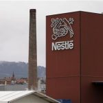 A Nestle logo is pictured on a factory in Orbe April 20, 2012. REUTERS/Joao Vieria