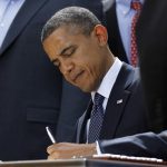 Obama signs jobs bill, praises private sector