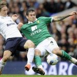 Tottenham Hotspur's Luka Modric (L) is challenged by Norwich City's Bradley Johnson (R) during their English Premier League soccer match at White Hart Lane in London, April 9, 2012. REUTERS/Paul Hackett