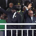 South Sudan's President Salva Kiir (L) and his Sudan counterpart Omar Hassan al-Bashir wave to the crowd during the Independence Day ceremony in Juba, July 9, 2011. REUTERS/Thomas Mukoya