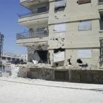 Damaged building seen at Al Qusoor district of Homs April 6, 2012. Picture taken April 6, 2012. REUTERS/Waseem Al Qusoor/Shaam News Network/Handout