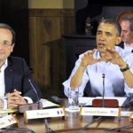 Saturday May 19, 2012: French President Francois Hollande, left, listens as President Obama speaks at G8 Summit at Camp David, Md. Read more: http://www.foxnews.com/politics/2012/05/19/obama-takes-women-issues-from-campaign-trail-into-international