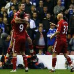 Liverpool's Jordan Henderson (C) celebrates his goal against Chelsea with teammates Andy Carroll (L) and Jonjo Shelvey during their English Premier League soccer match at Anfield in Liverpool, northern England May 8, 2012. REUTERS/Phil Noble