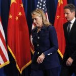 U.S. Secretary of State Hillary Clinton (L) and U.S. Treasury Secretary Timothy Geithner leave the stage of a news conference in Beijing May 4, 2012. REUTERS/Shannon Stapleton