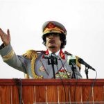 Libyan leader Muammar Gaddafi speaks during a ceremony to mark the 40th anniversary of the evacuation of the American military bases in the country, in Tripoli in this June 12, 2010 file photo. REUTERS/Ismail Zetouny/Files