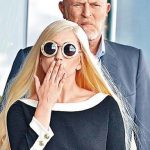 Lady Gaga leaves her hotel before her concert in Hong Kong.