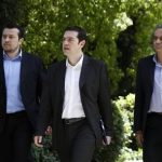 Head of Greece's Left Coalition party Alexis Tsipras (C) leaves the presidential palace after a meeting in Athens May 13, 2012. REUTERS/John Kolesidis
