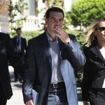 Head of Greece's Left Coalition party Alexis Tsipras (C), accompanied by party officials, leaves from the Presidential palace following a meeting with political leaders and the Greek President in Athens May 15, 2012. REUTERS/Yorgos Karahalis
