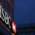 A HSBC logo is seen on the Private Bank Building in Geneva in this March 28, 2011 file photo. REUTERS/Denis Balibouse/Files