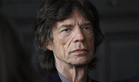 Musician Mick Jagger is seen before the L'Wren Scott Fall/Winter 2012 collection during New York Fashion Week February 16, 2012. REUTERS/Carlo Allegri