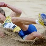 Christian Olsson of Sweden compete during the men's triple jump final event at the IAAF World Indoor Athletics Championships at the Aspire Dome in Doha March 14, 2010. REUTERS/Mohammed Dabbous