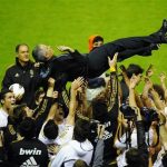 Real Madrid's coach Jose Mourinho is thrown into the air by his players after their win over Athletic Bilbao to win the Spanish first division league title at San Mames stadium, May 2, 2012. REUTERS/Vincent West