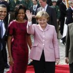 U.S. President Barack Obama (L-R), first lady Michelle Obama, German Chancellor Angela Merkel and her husband Joachim Sauer pose at a market place near the town hall in Baden-Baden in this April 3, 2009 file photograph. GERMANY/SAUER REUTERS/Fabrizio Bensch/Files