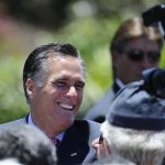 Mitt Romney, U.S. Republican presidential candidate and former Massachusetts governor, shakes hands with supporters during a memorial day ceremony held at the Veterans Museum & Memorial Center in San Diego, California May 28, 2012. REUTERS/Denis Poroy