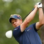 Britian's Luke Donald watches his tee shot on the second hold during the final round of the Players Championship PGA golf tournament at TPC Sawgrass in Ponte Vedra Beach, Florida May 13, 2012. REUTERS/Chris Keane