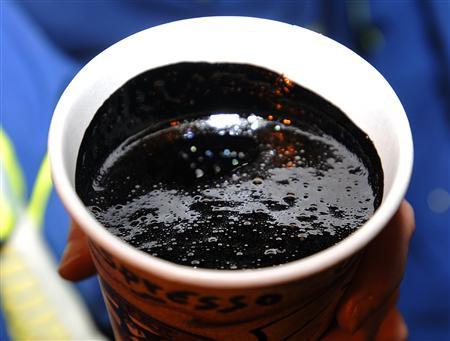 To match Insight CANADA/OIL-SANDS A cup of heavy oil produced at the
Statoil oil sands operation near Conklin, Alberta, is seen in this file picture taken November 3, 2011.
REUTERS/Todd Korol/Files