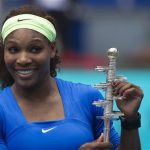 Serena Williams of the U.S. poses with the Ion Tiriac trophy after winning the final tennis match over Victoria Azarenka of Belarus at the Madrid Open tennis
