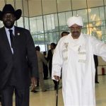 Sudan's President Omar al-Bashir welcomes his South Sudanese counterpart Salva Kiir during his arrival at Khartoum Airport October 8,2011 for his first visit since southern secession to discuss key unresolved issues, including Abyei and oil, that have undermined north-south relations. REUTERS/ Mohamed Nureldin Abdallah