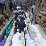 People gather at a mass burial for the victims purportedly killed during an artillery barrage from Syrian forces in Houla in this handout image dated May 26, 2012. REUTERS/Shaam News Network/Handout