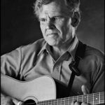 Musician Doc Watson poses backstage at McCabe's Guitar Shop in Santa Monica, California, in this 1986 publicity photo released to Reuters on May 25, 2012. Grammy-winning folk musician Watson died May 29, 2012 at the age of 89 after undergoing colon surgery last week at a North Carolina hospital, according to his management team. REUTERS/Peter D. Figen/Handout