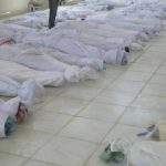he bodies of people killed by government security forces lie on the ground at Ali Bin Al Hussein mosque in Huola, near Homs May 26, 2012
