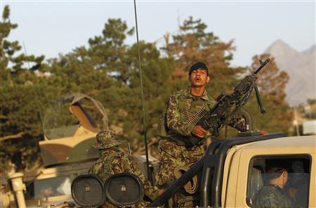 Afghan National Army soldiers arrive at the site of an attack on the outskirts of Kabul Afghan National Army soldiers arrive at the site of an attack on the outskirts of Kabul June 22, 2012. REUTERS/Omar Sobhani