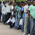 African refugees and migrant workers stand in a charity food line in south Tel Aviv June 11, 2012. REUTERS/Baz Ratner