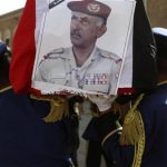 Soldiers carry the coffin of Major General Salem Ali Qatan, the slain commander of military forces in the south of Yemen, in Sanaa June 19, 2012. REUTERS/Mohamed al-Sayaghi
