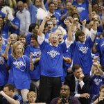 Chesapeake Energy Corp CEO and Oklahoma City Thunder Board of Directors member Aubrey McClendon (C) cheers on the Thunder in the finals seconds against the Los Angeles Lakers Game 3 of their NBA Western Conference playoff series in Oklahoma City, in this April 22, 2010 file photo. REUTERS/Bill Waugh/Files