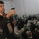 Enologist Celito Guerra takes wine samples to analyze during a tour of a winery in Bento Goncalves, in the southern state of Rio Grande do Sul, May 9, 2012. REUTERS/Edison Vara
