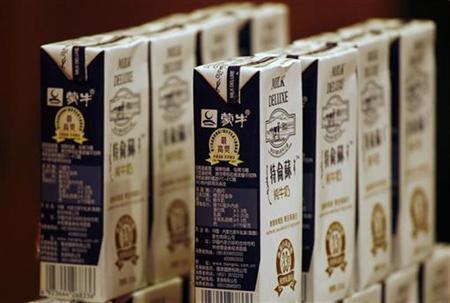 Products of China Mengniu Dairy are displayed at a news conference in Hong Kong Products of China Mengniu Dairy, one of China's leading dairy products company, are displayed at a news conference announcing the company's interim results in Hong Kong September 19, 2008. REUTERS/Bobby Yip